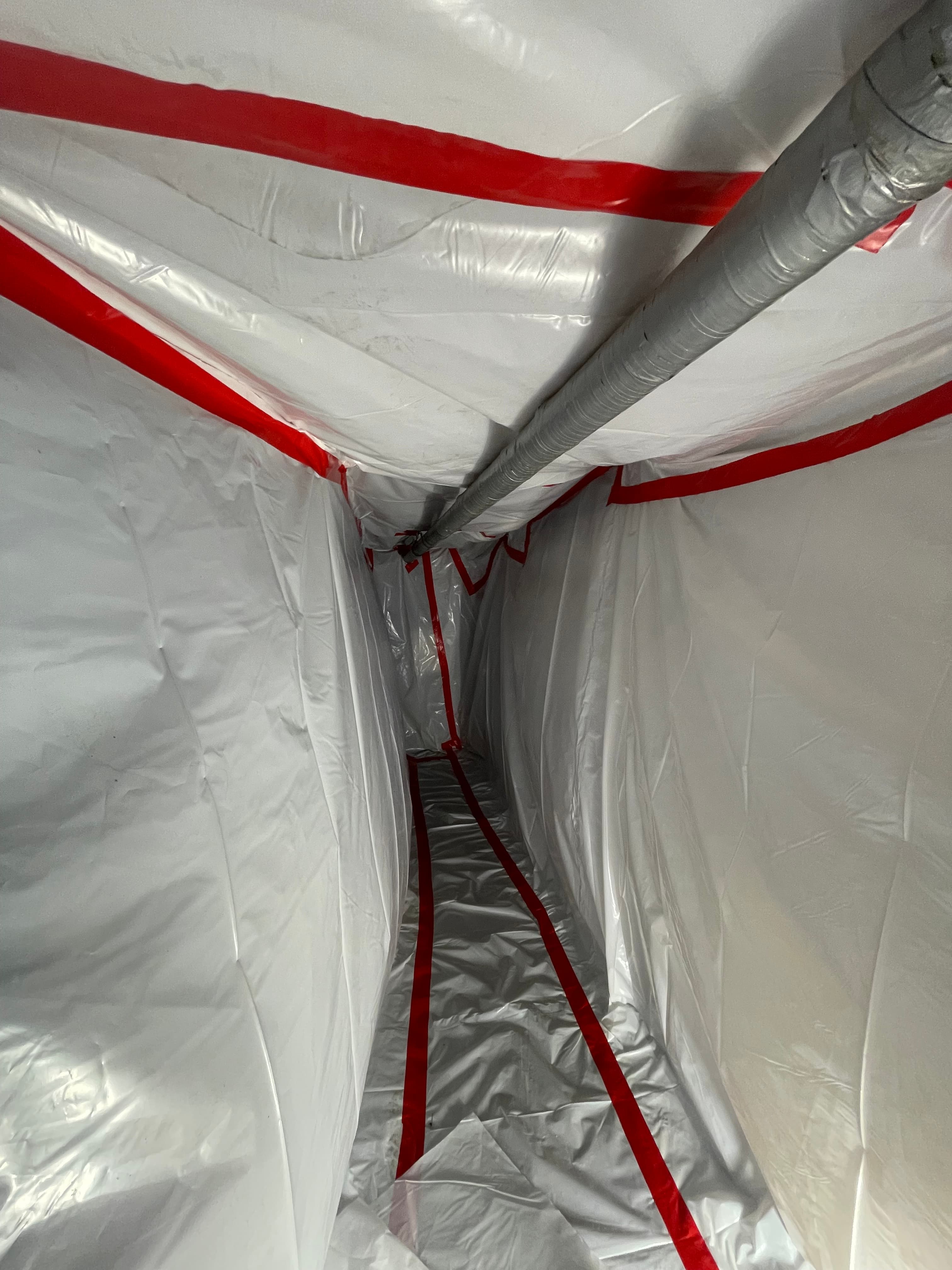 Asbestos pipe insulation removal