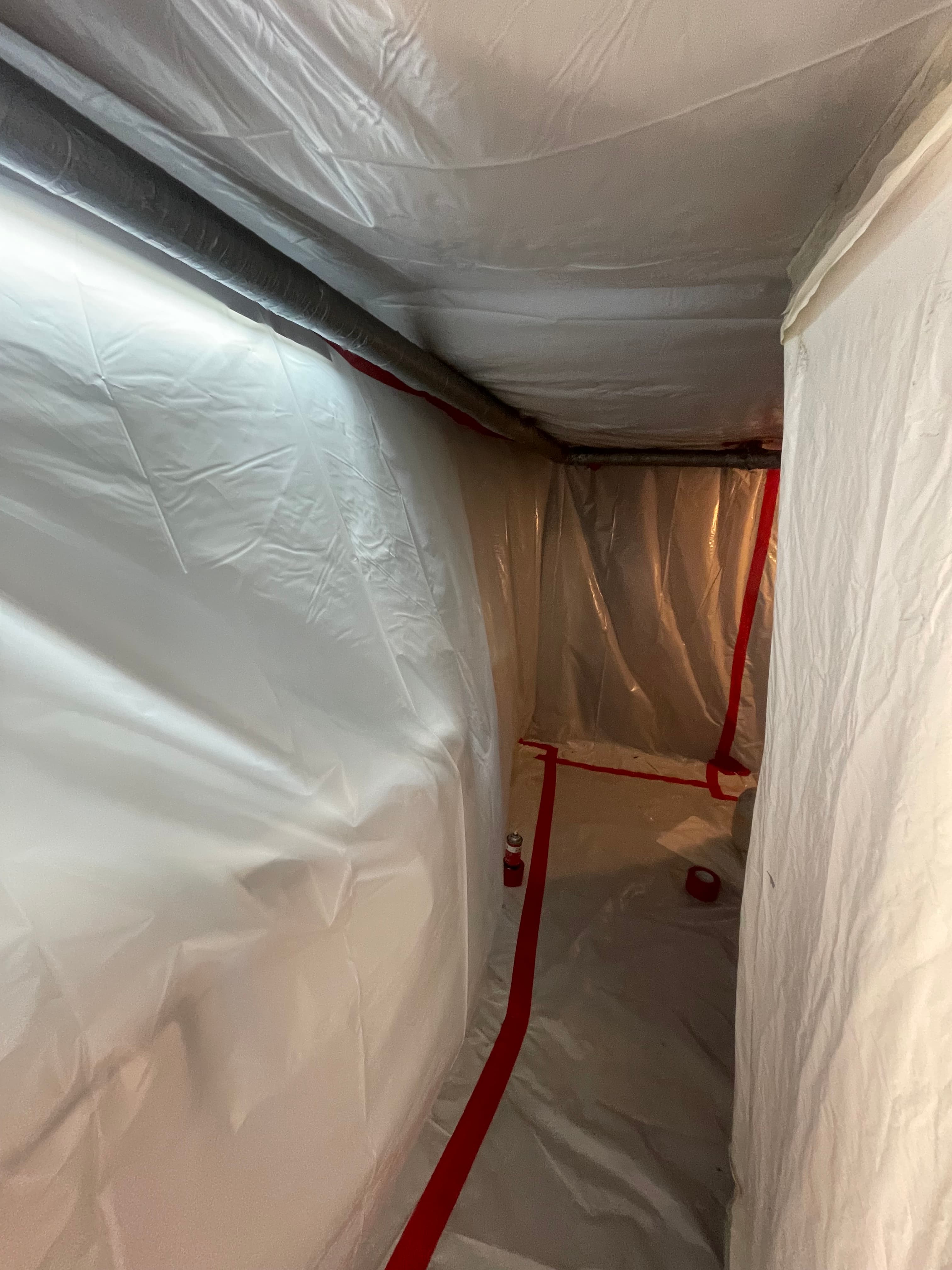 Asbestos pipe insulation removal